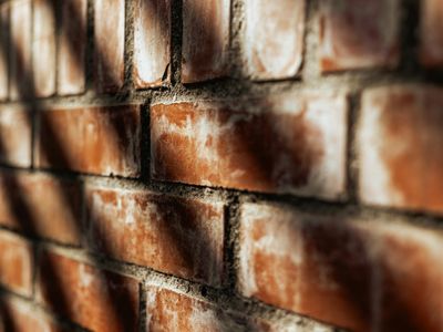 Abstract play of light and shadow on white wall