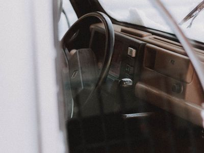 Blurred view of a park through a glass window